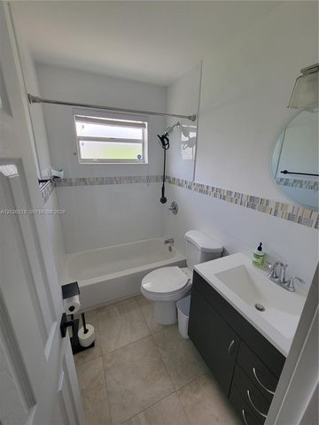1052 SW 79th Ave ., Miami, FL 33144