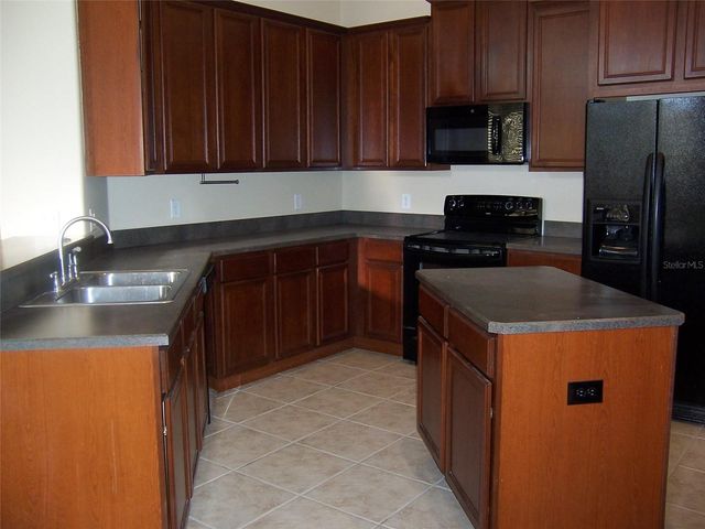 2748 BLOWING BREEZE WAY, Orlando, FL 32820