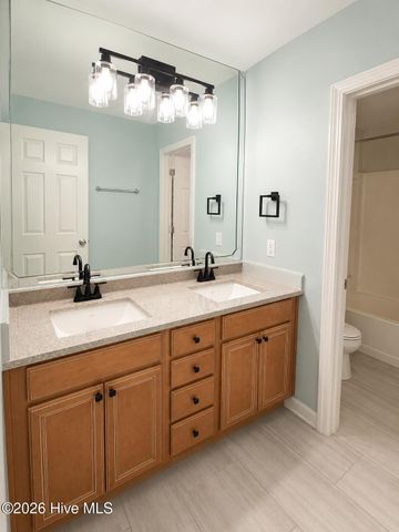 308 E Beach Drive, Oak Island, NC 28465