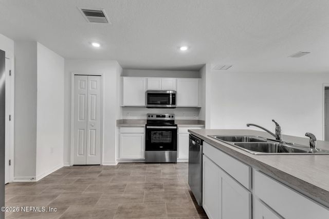 22 ROUND TREE Drive, Palm Coast, FL 32164