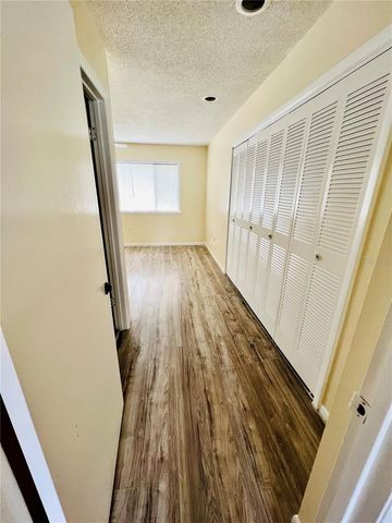 6057 WINDHOVER DRIVE E-08, Orlando, FL 32819
