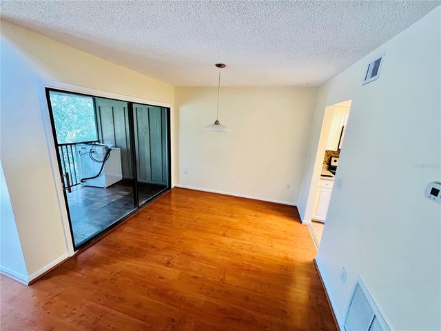 6057 WINDHOVER DRIVE E-08, Orlando, FL 32819
