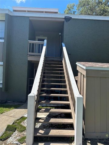 6057 WINDHOVER DRIVE E-08, Orlando, FL 32819