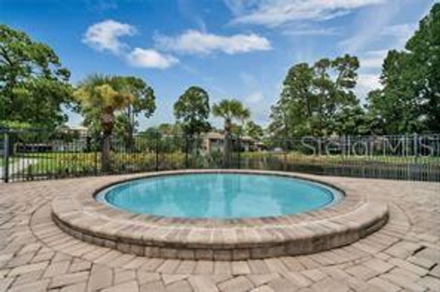 6057 WINDHOVER DRIVE E-08, Orlando, FL 32819