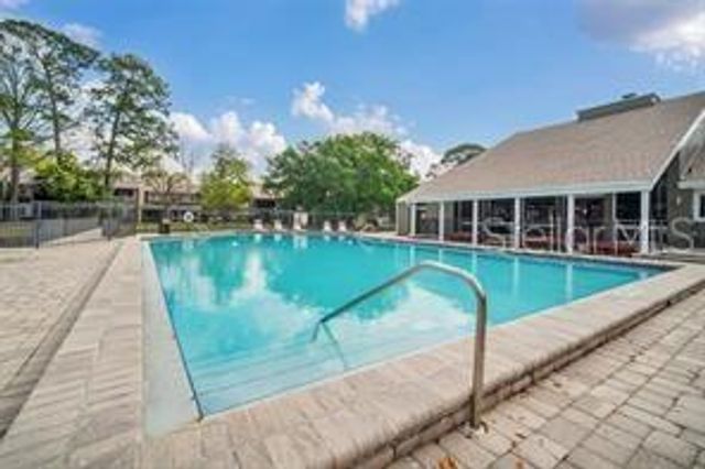 6057 WINDHOVER DRIVE E-08, Orlando, FL 32819