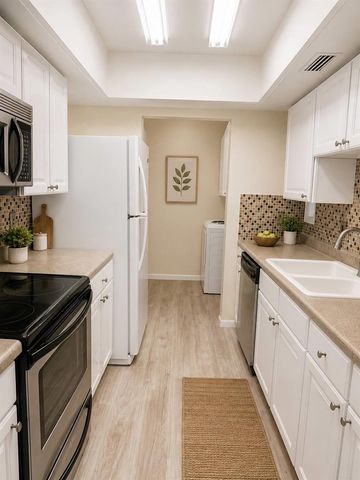 6057 WINDHOVER DRIVE E-08, Orlando, FL 32819