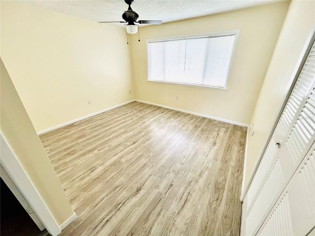 6057 WINDHOVER DRIVE E-08, Orlando, FL 32819