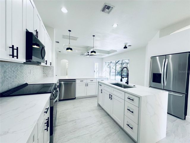 13792 LONG LAKE LANE, Port Charlotte, FL 33953