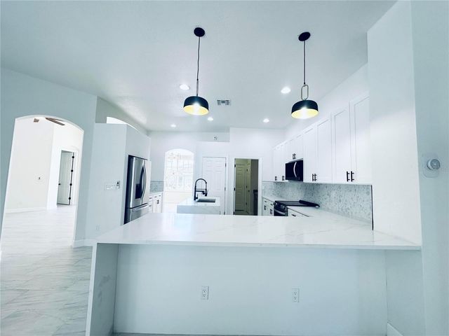 13792 LONG LAKE LANE, Port Charlotte, FL 33953