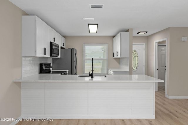 12036 Country Cove Avenue, Hudson, FL 34669