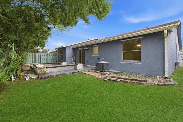 6130 Bluegrass Circle, Greenacres, FL 33463