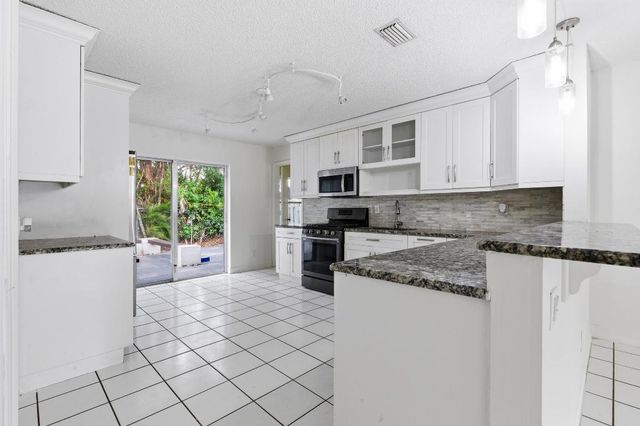 6130 Bluegrass Circle, Greenacres, FL 33463