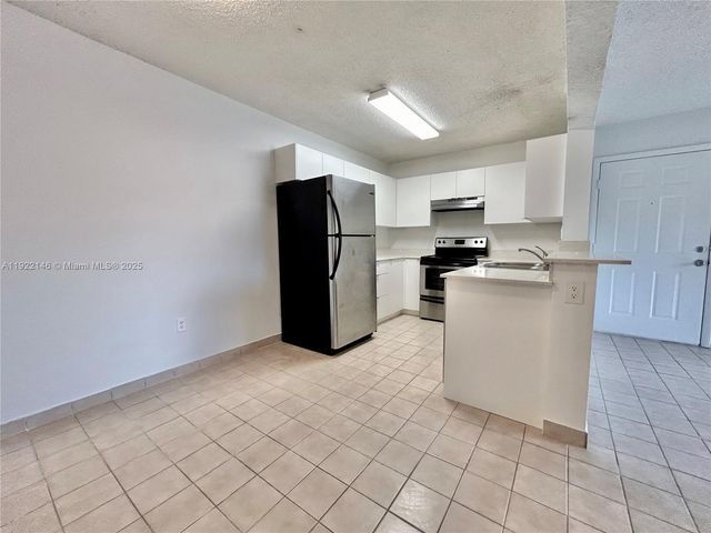 301 Palm Way 104, Pembroke Pines, FL 33025