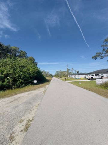 1957 MCLAREN AVENUE, Lehigh Acres, FL 33972