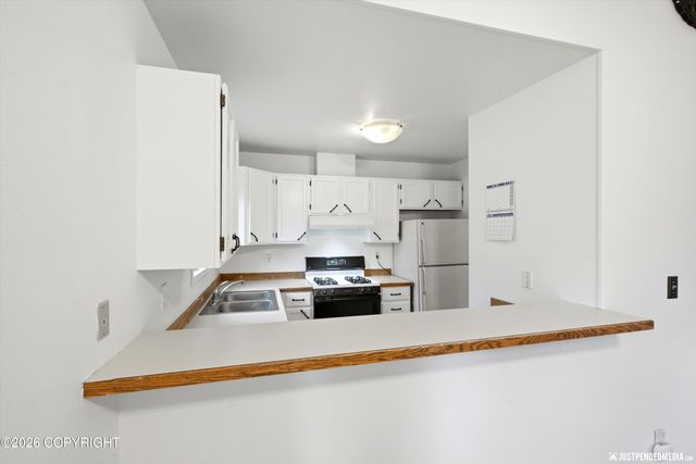 7721 Regal Mountain Drive, Anchorage, AK 99504