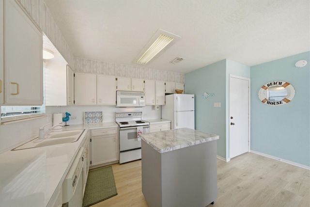 215 Redfish Drive, Freeport, TX 77541