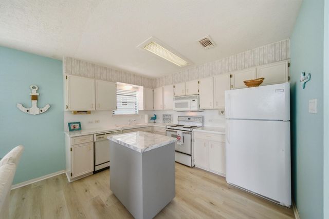 215 Redfish Drive, Freeport, TX 77541