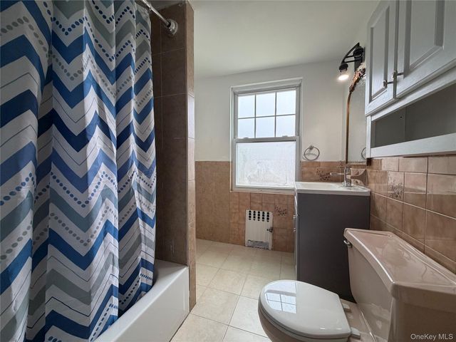 7039 57th Drive, Maspeth, NY 11378