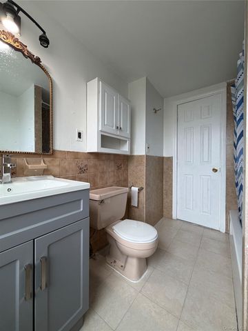 7039 57th Drive, Maspeth, NY 11378