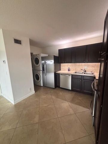 203 Foxtail Drive C1, Greenacres, FL 33415