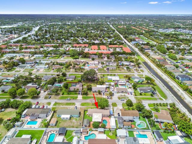 1560 Roy Drive, West Palm Beach, FL 33415