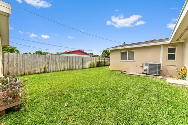 1560 Roy Drive, West Palm Beach, FL 33415