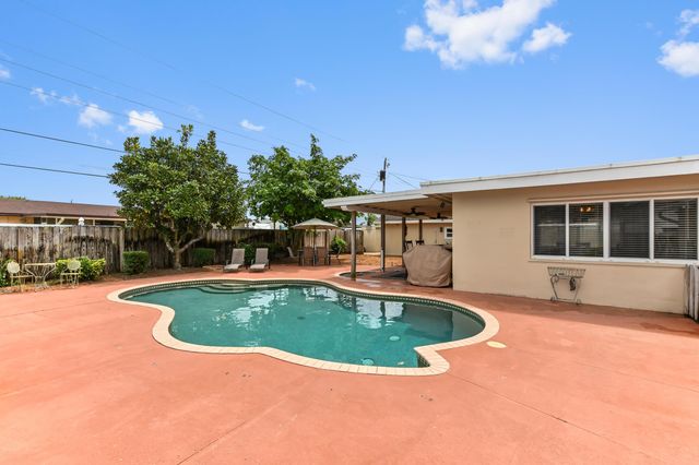 1560 Roy Drive, West Palm Beach, FL 33415