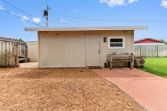 1560 Roy Drive, West Palm Beach, FL 33415