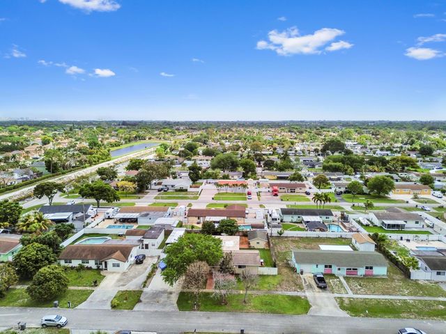 1560 Roy Drive, West Palm Beach, FL 33415