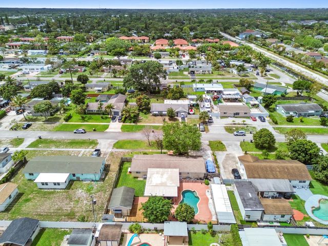 1560 Roy Drive, West Palm Beach, FL 33415