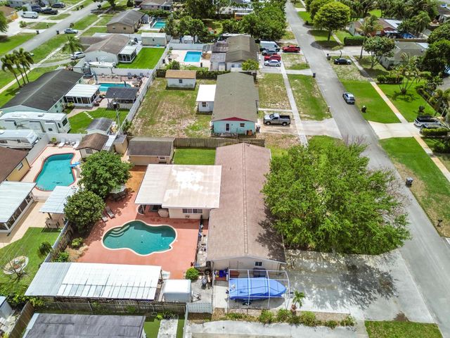 1560 Roy Drive, West Palm Beach, FL 33415