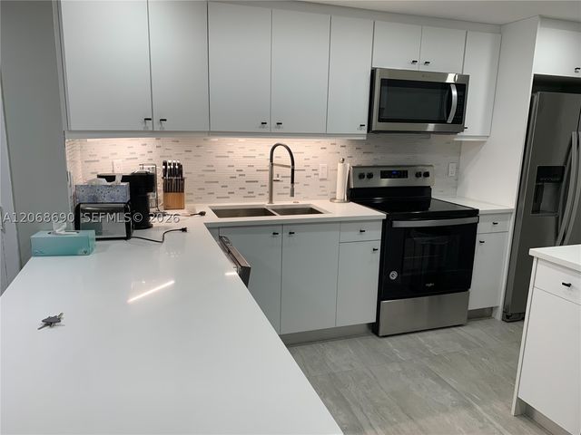 100 Golden Isles Dr 409, Hallandale Beach, FL 33009