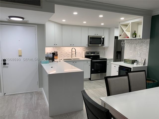 100 Golden Isles Dr 409, Hallandale Beach, FL 33009