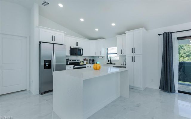 416 NW 25th AVE, Cape Coral, FL 33993