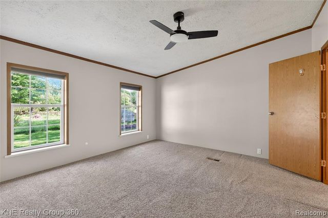 672 Red Oaks Drive, Howell, MI 48843