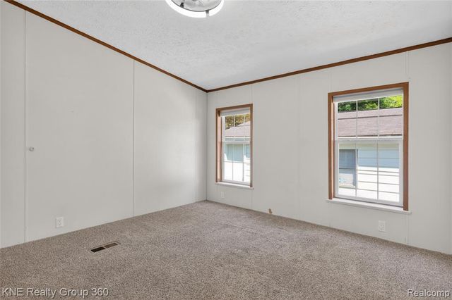 672 Red Oaks Drive, Howell, MI 48843