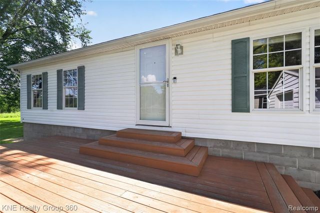 672 Red Oaks Drive, Howell, MI 48843