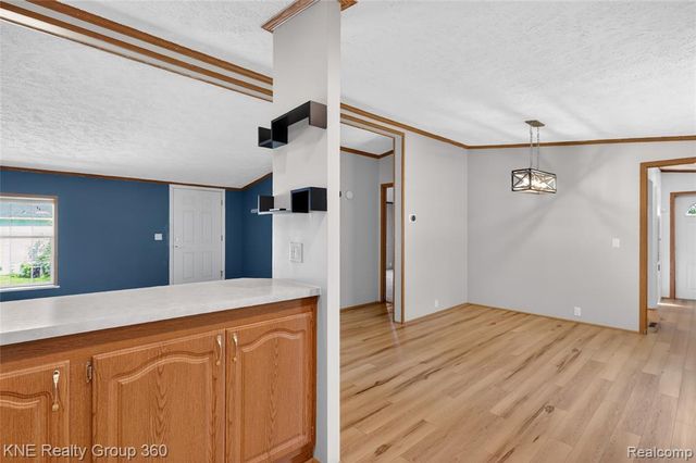 672 Red Oaks Drive, Howell, MI 48843