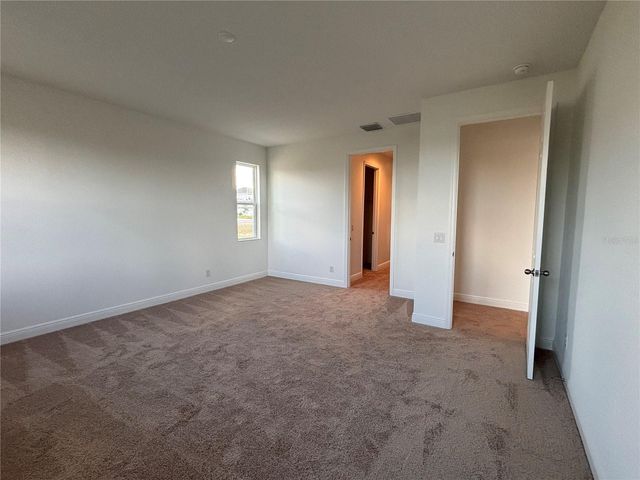 7024 ROLLING GARDENS LOOP, Groveland, FL 34736