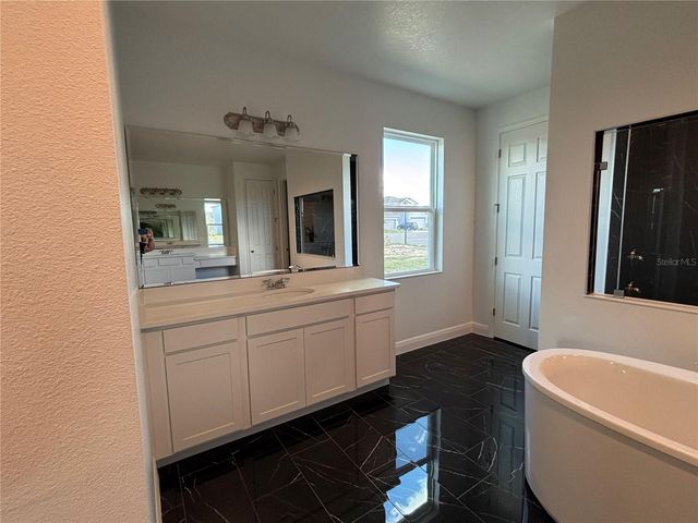 7024 ROLLING GARDENS LOOP, Groveland, FL 34736