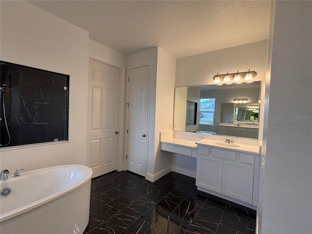 7024 ROLLING GARDENS LOOP, Groveland, FL 34736