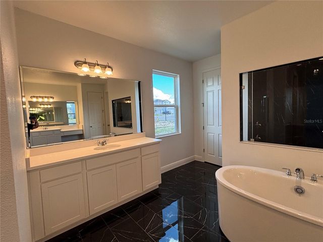 7024 ROLLING GARDENS LOOP, Groveland, FL 34736