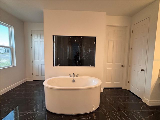 7024 ROLLING GARDENS LOOP, Groveland, FL 34736