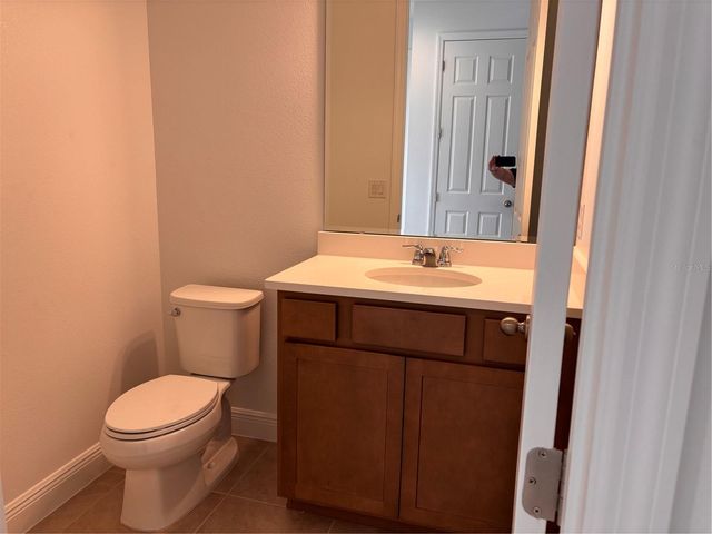 7024 ROLLING GARDENS LOOP, Groveland, FL 34736