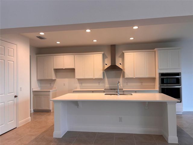 7024 ROLLING GARDENS LOOP, Groveland, FL 34736