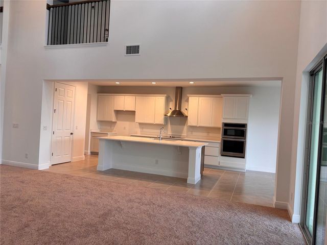 7024 ROLLING GARDENS LOOP, Groveland, FL 34736