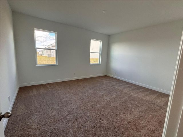 7024 ROLLING GARDENS LOOP, Groveland, FL 34736