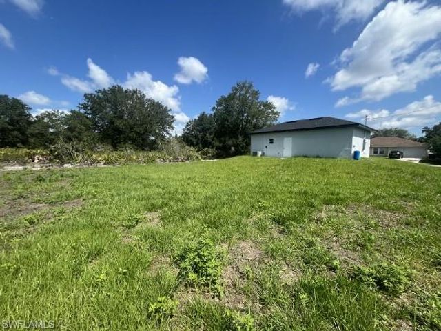 571 Genoa AVE S, Lehigh Acres, FL 33974
