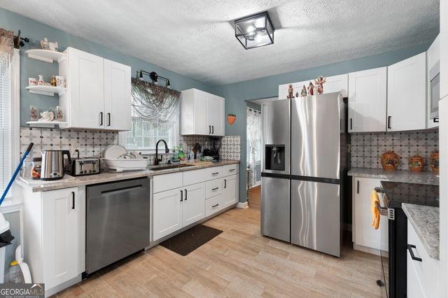 5083 Flakes Mill Road, Ellenwood, GA 30294