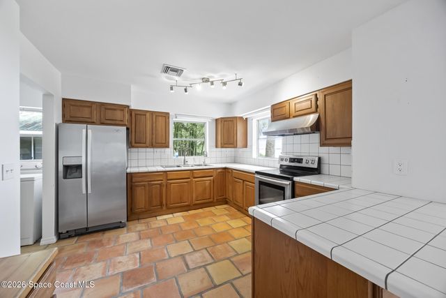 8690 S Tropical Trail, Merritt Island, FL 32952